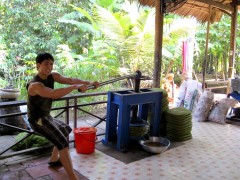 G working out at Mekong coconut factory